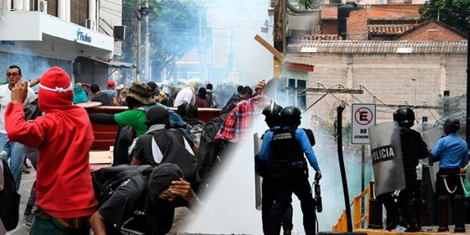 Policía hondureña reprime marcha del Día del Trabajador en Tegucigalpa