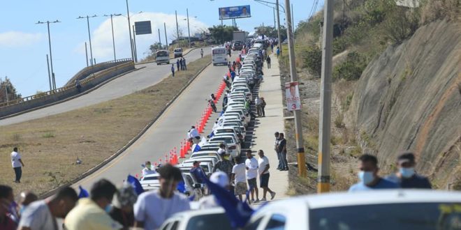 Impresionante caravana de Papi a la Orden y David Chávez recorre la capital